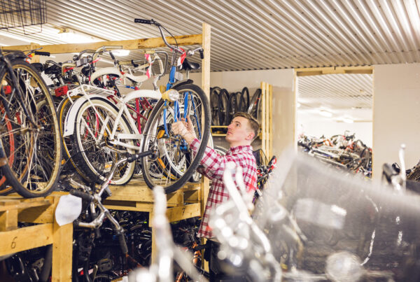 A Man Working In His Bicycle Shop in Surrey, UK.