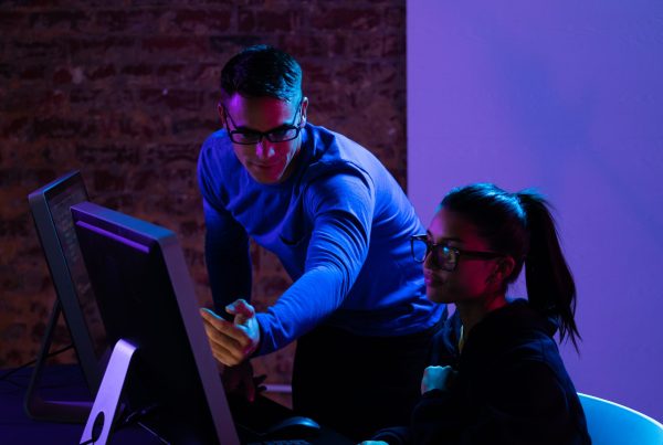 Two people carrying out penetration testing